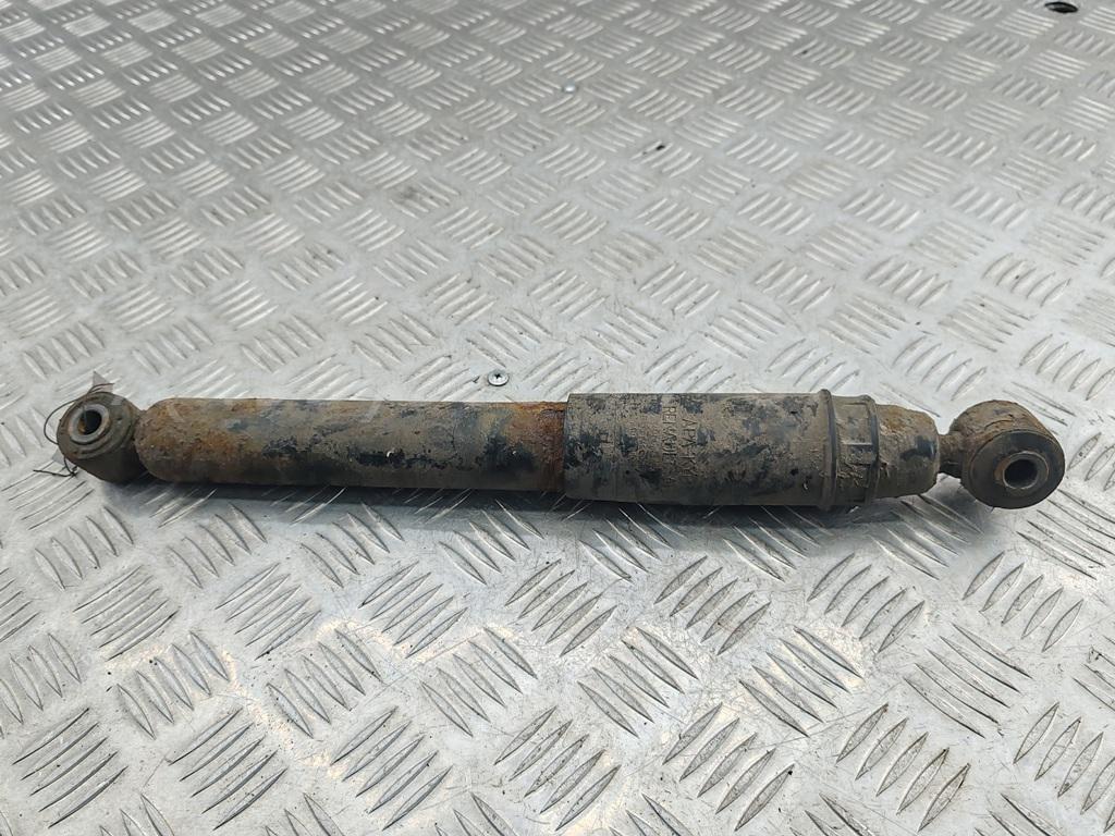 Амортизатор задний левый