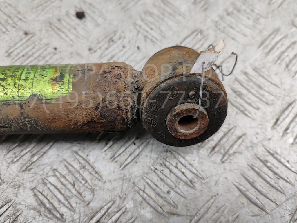 Амортизатор задний левый