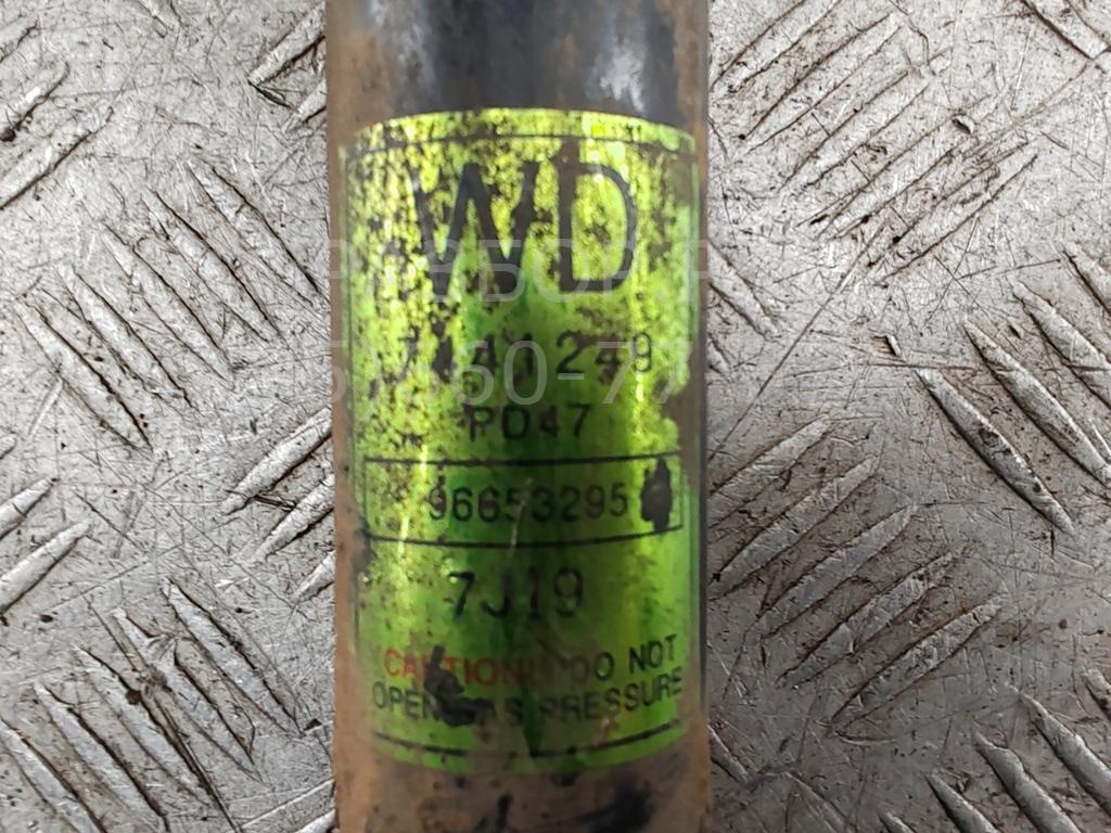 Амортизатор задний левый