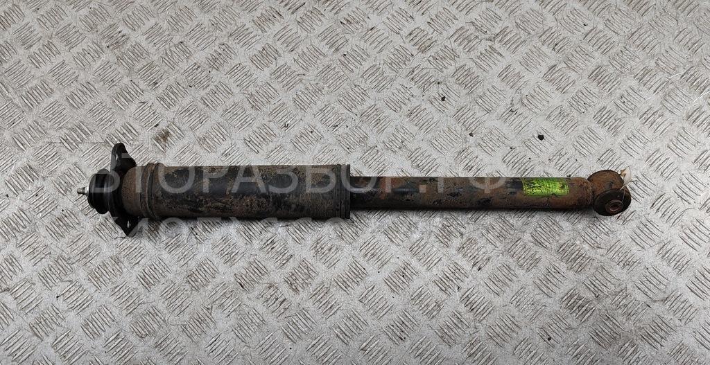 Амортизатор задний левый