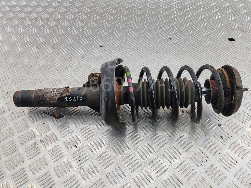 Амортизатор передний левый