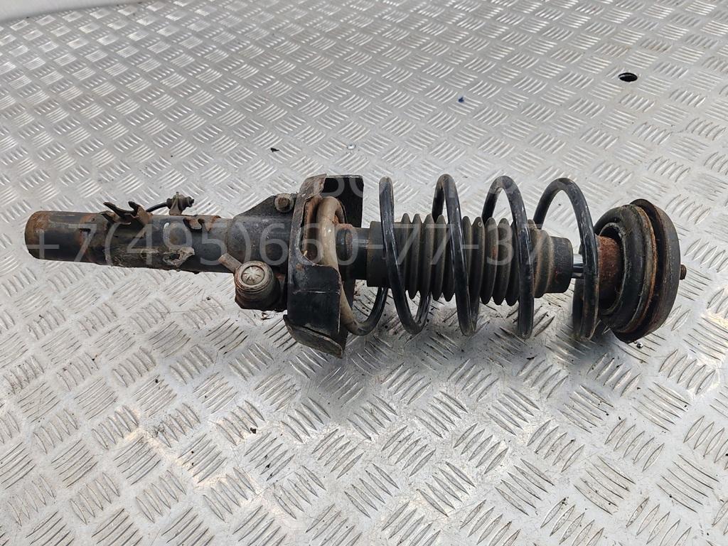 Амортизатор передний левый