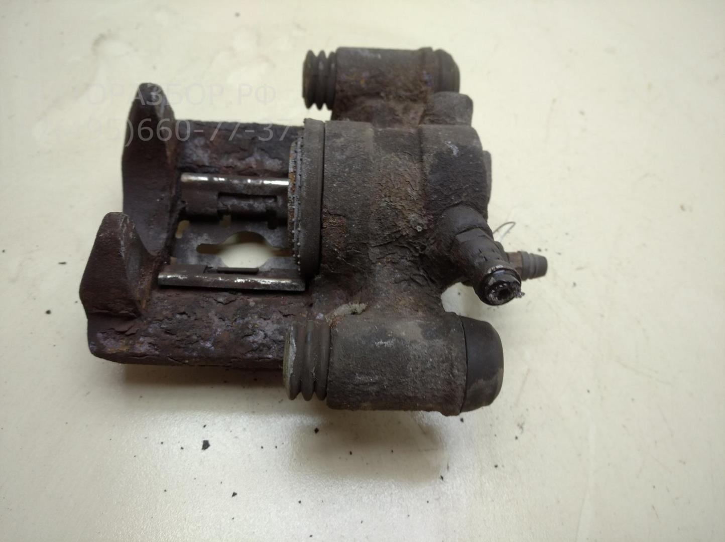 Суппорт задний правый