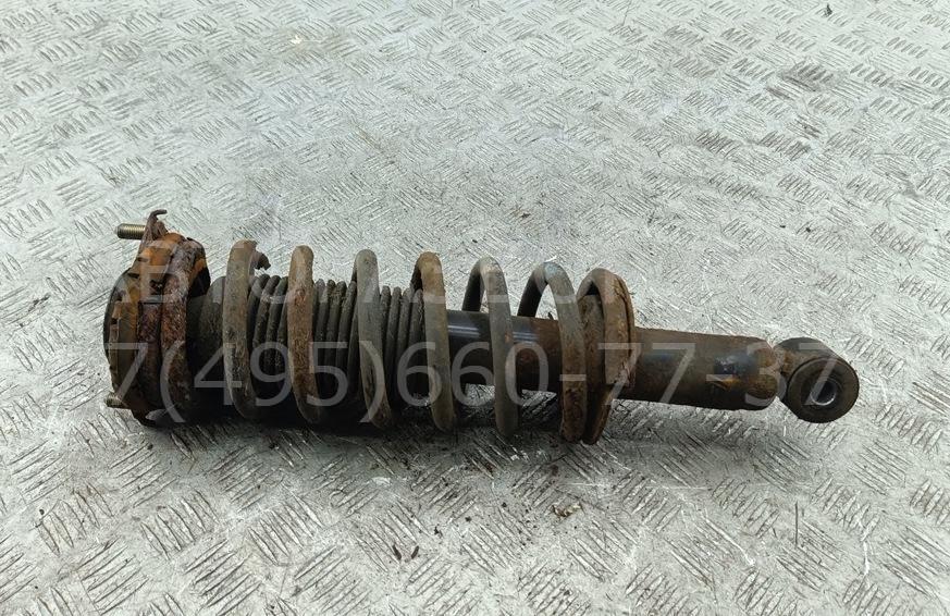 Амортизатор задний левый