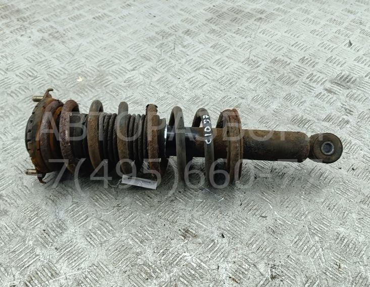 Амортизатор задний левый