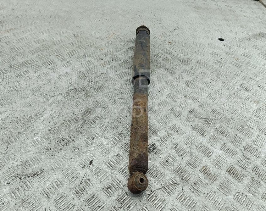 Амортизатор задний левый