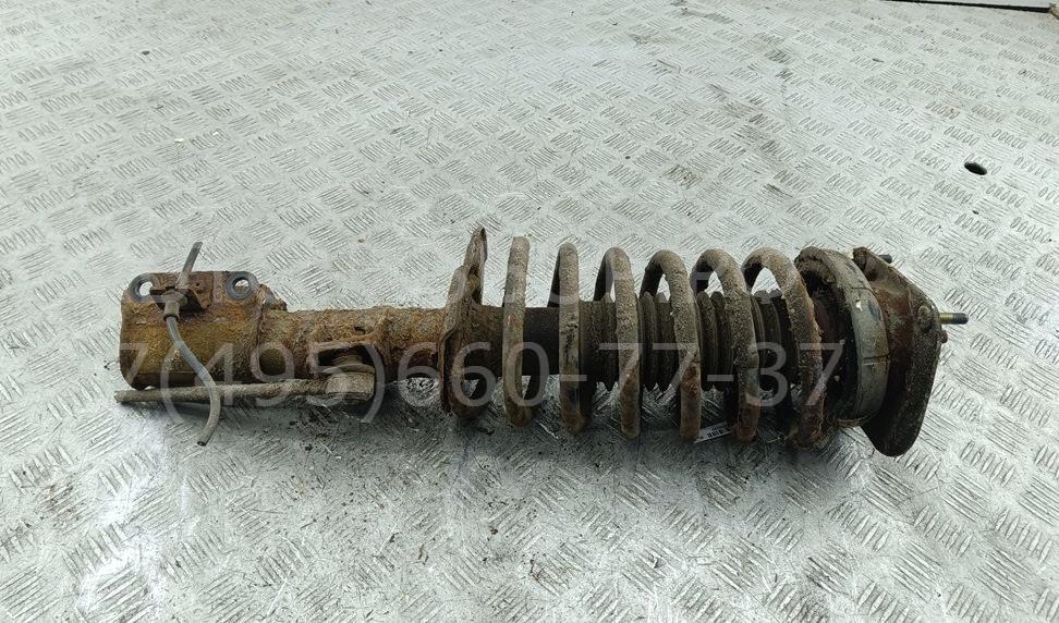 Амортизатор передний левый