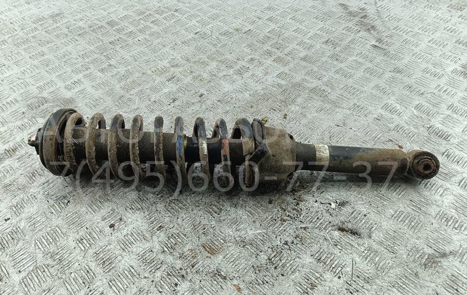 Амортизатор задний левый