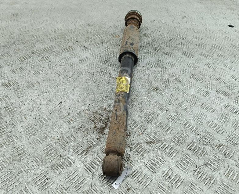 Амортизатор задний левый