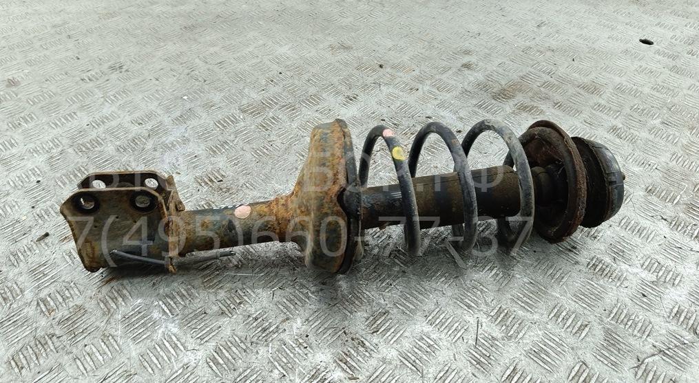 Амортизатор передний левый