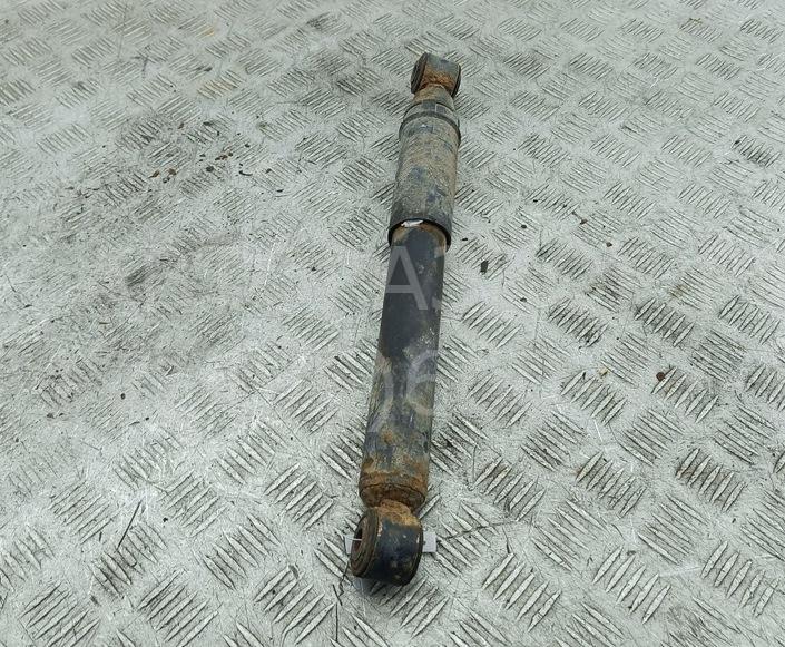 Амортизатор задний левый