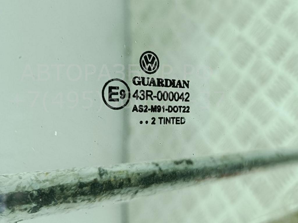 Стекло двери передней левой