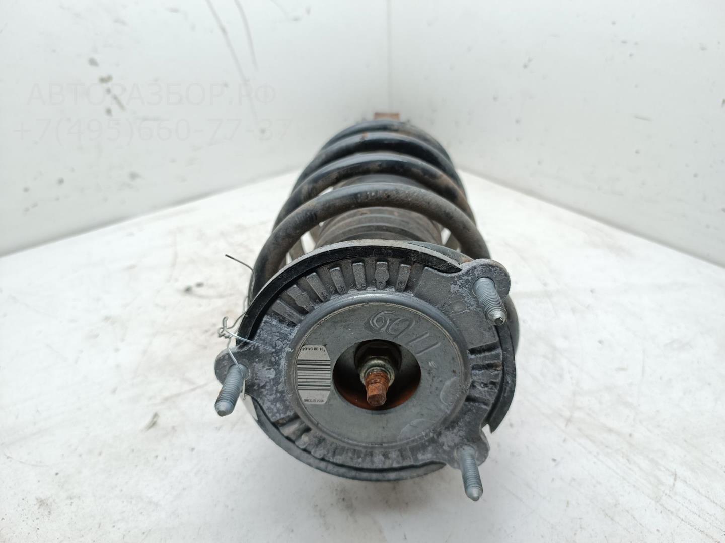 Амортизатор передний левый