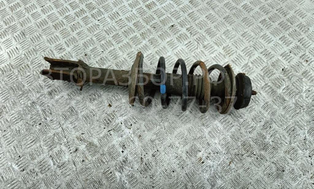 Амортизатор передний левый