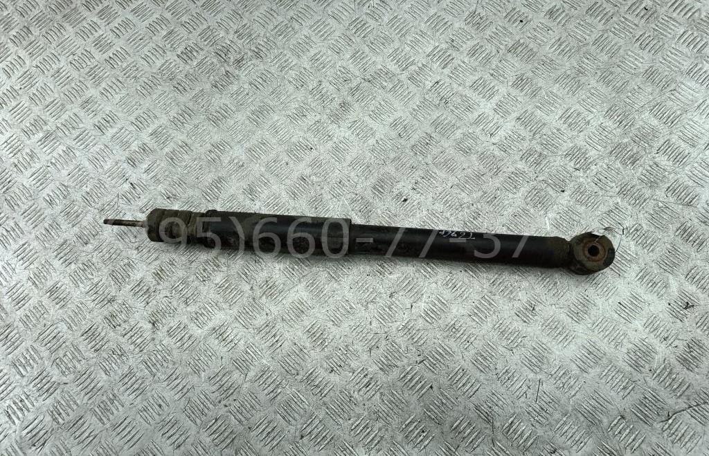 Амортизатор задний левый