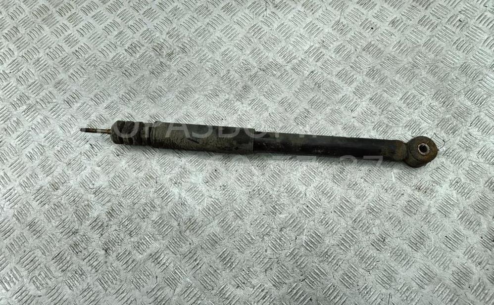 Амортизатор задний левый