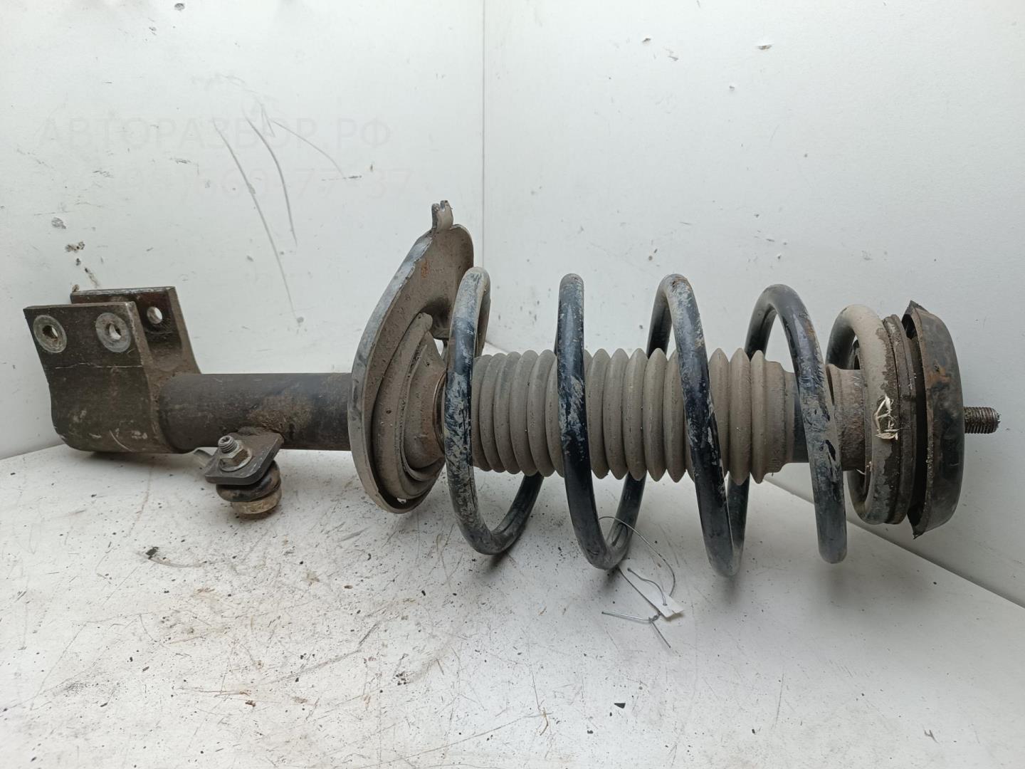 Амортизатор передний левый