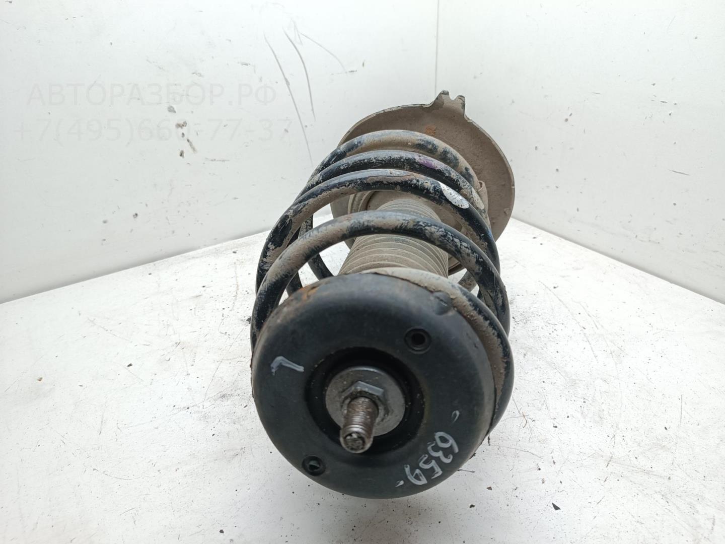 Амортизатор передний левый