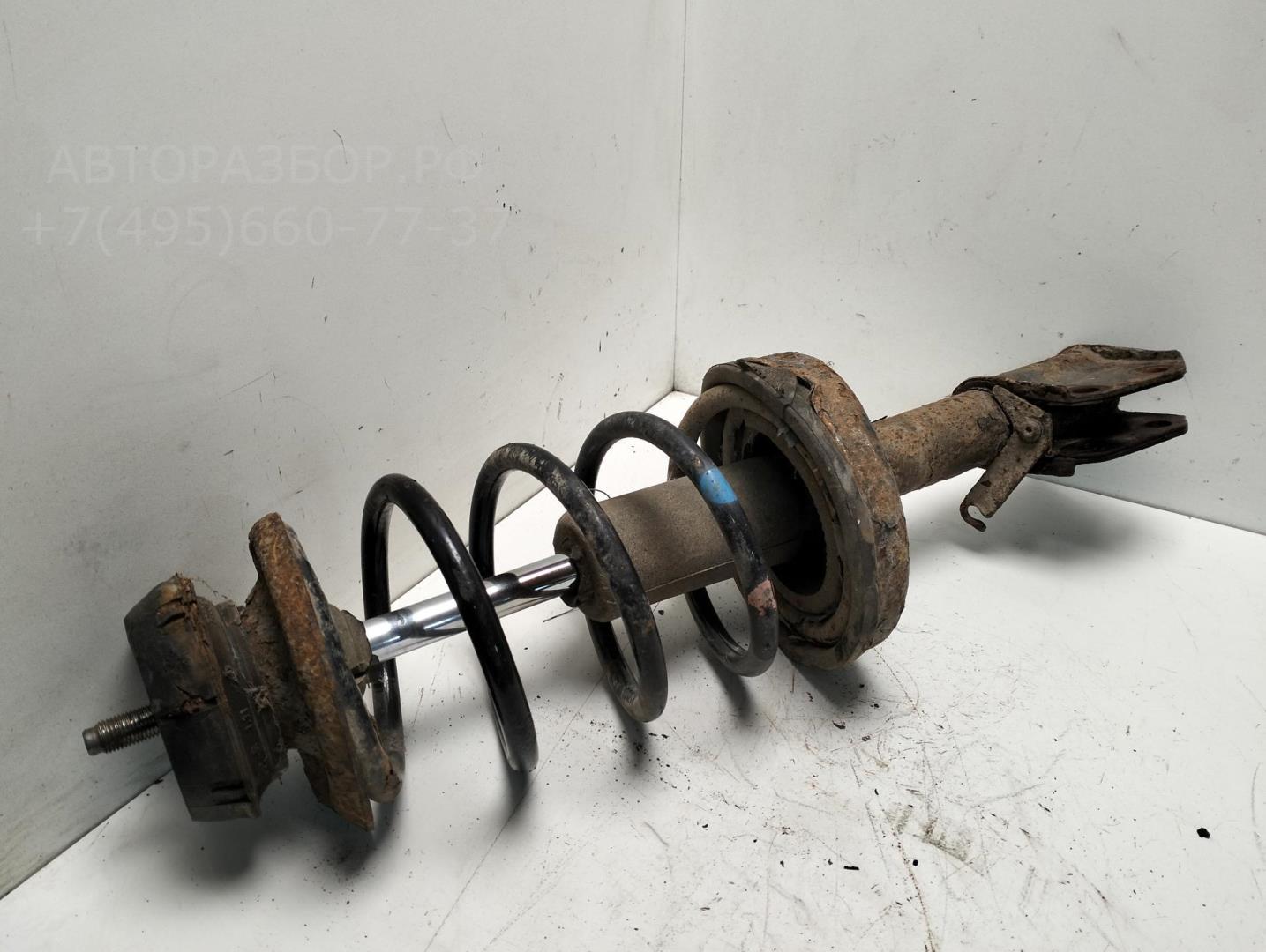 Амортизатор передний левый