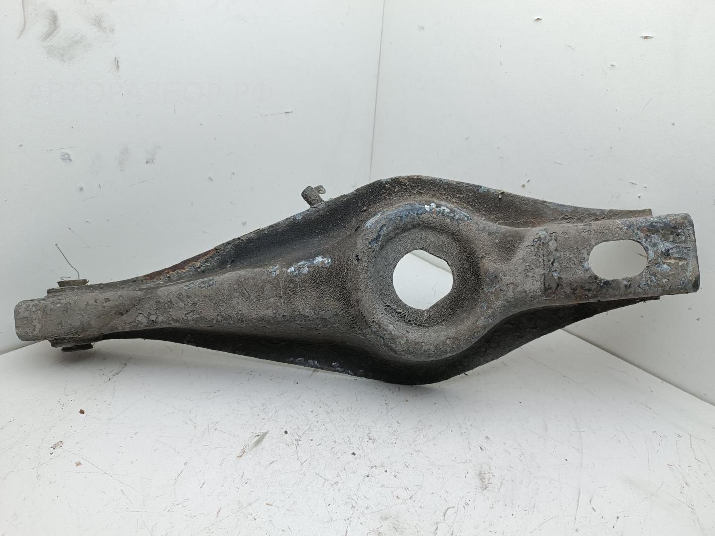 Рычаг задний левый