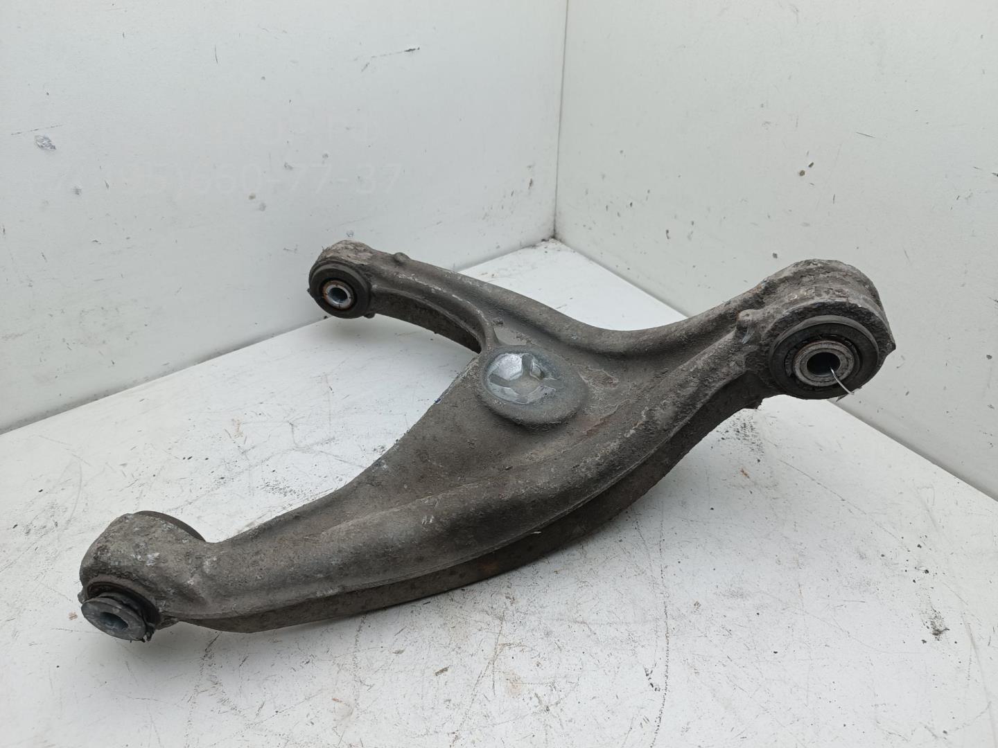 Рычаг задний левый