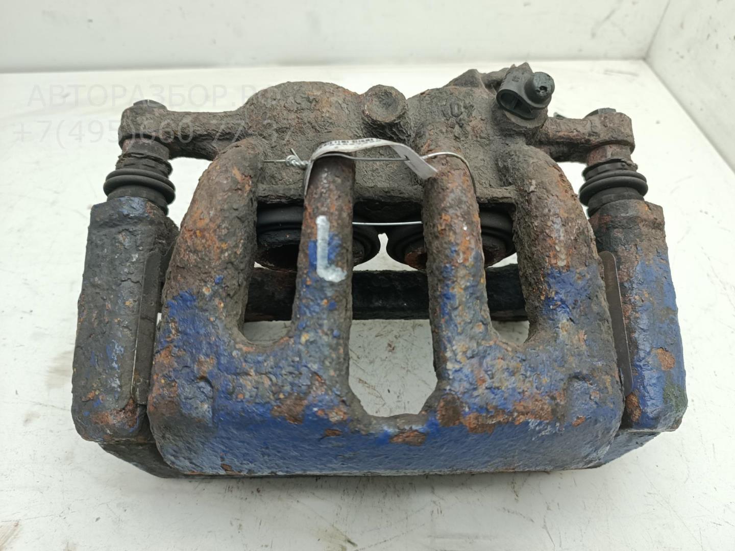 Суппорт передний левый