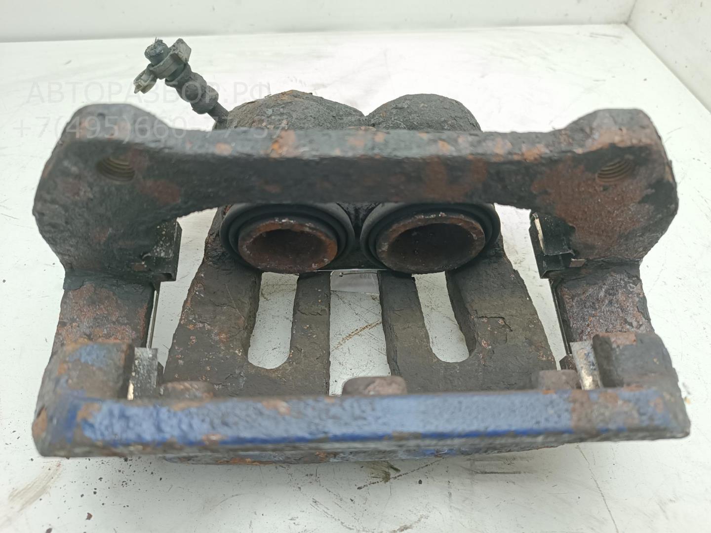 Суппорт передний левый