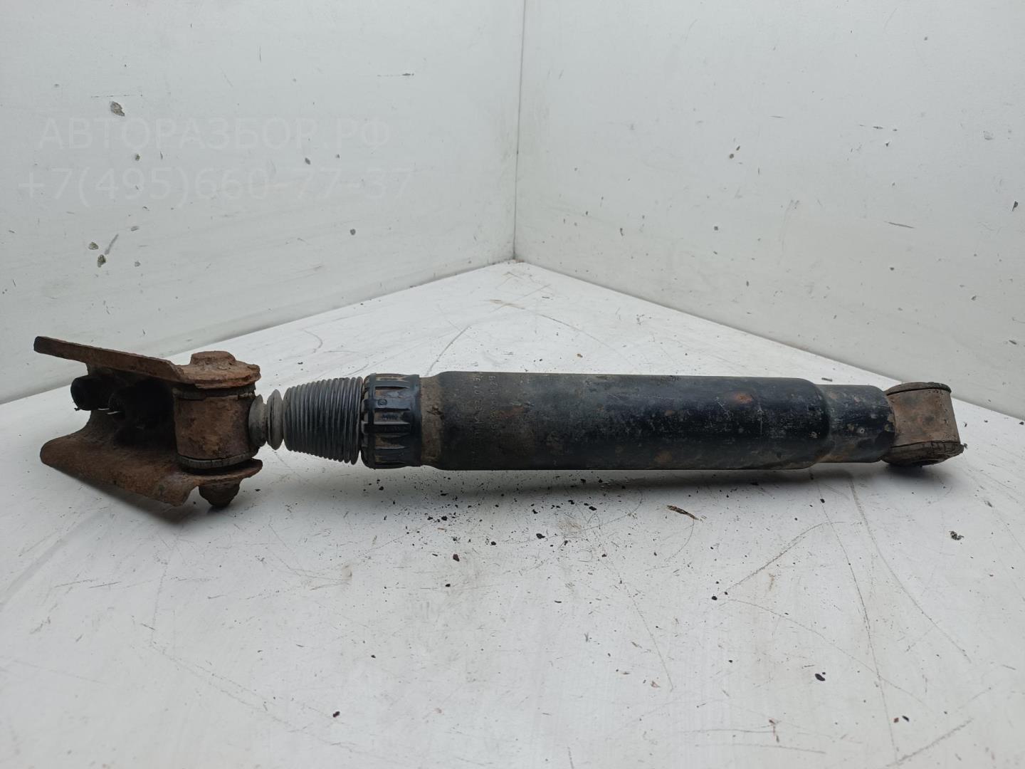 Амортизатор задний левый