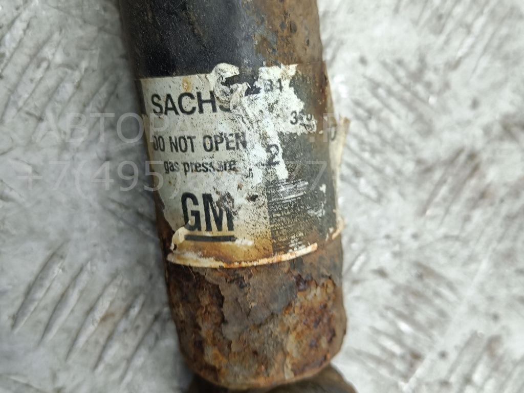 Амортизатор задний левый