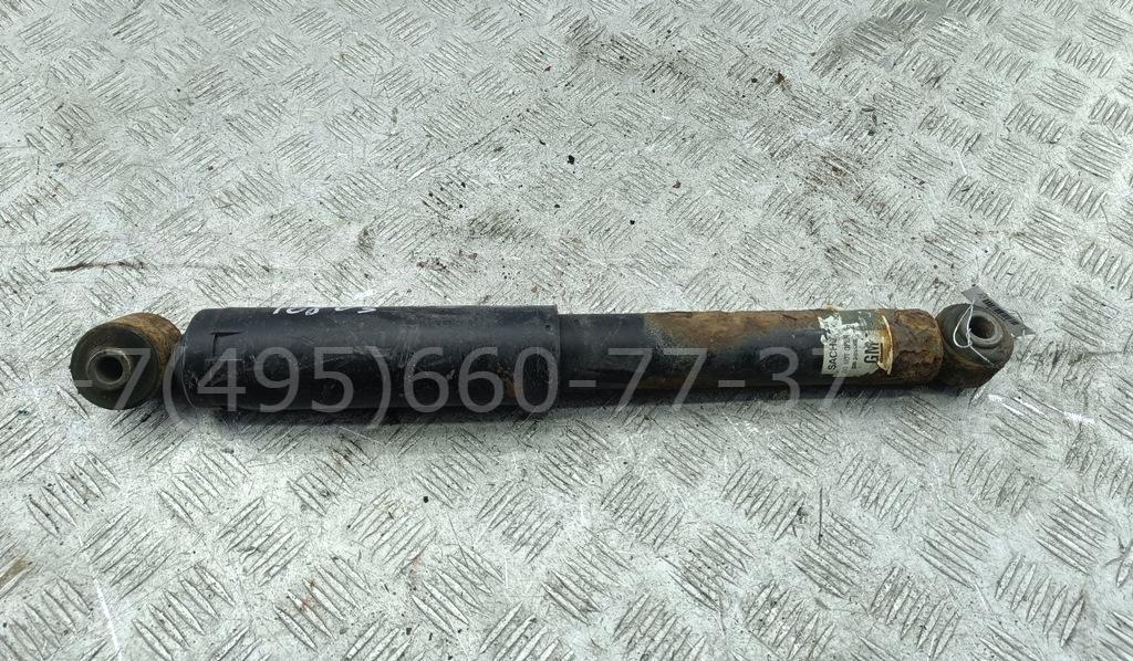 Амортизатор задний левый