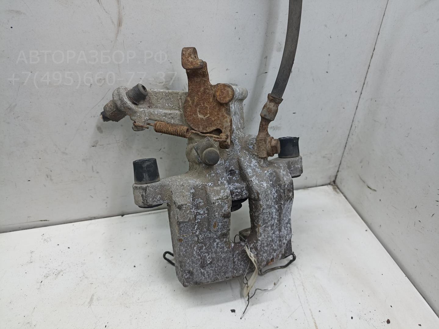 Суппорт задний левый