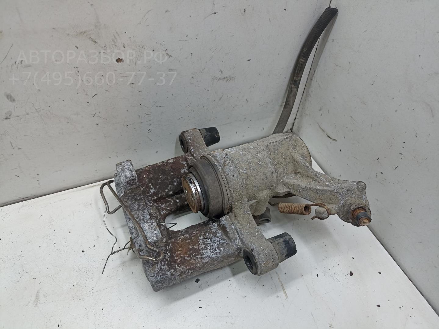 Суппорт задний левый