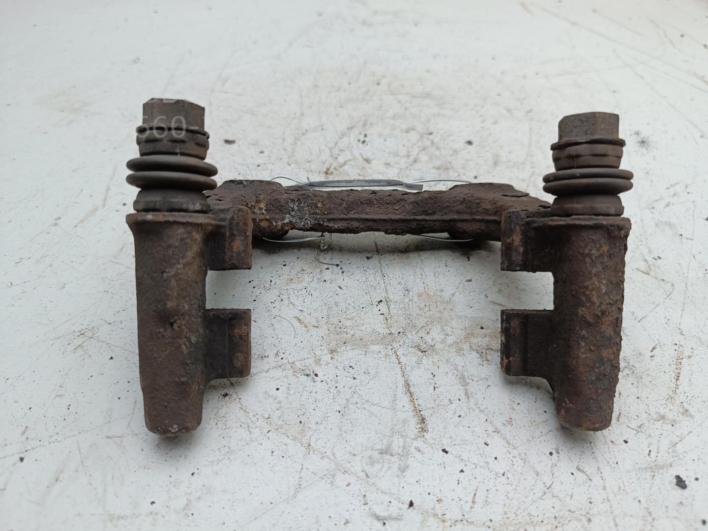 Скоба суппорта заднего