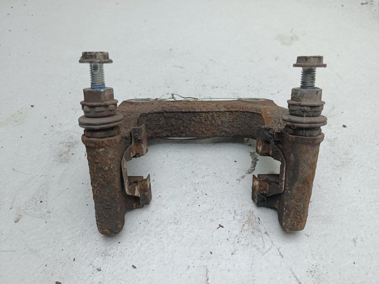 Скоба суппорта заднего