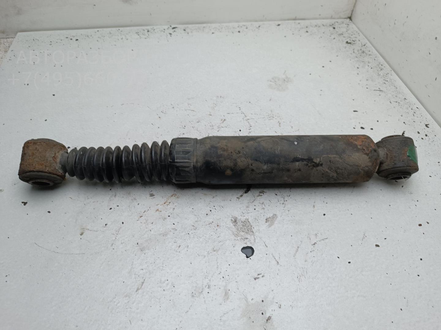 Амортизатор задний левый