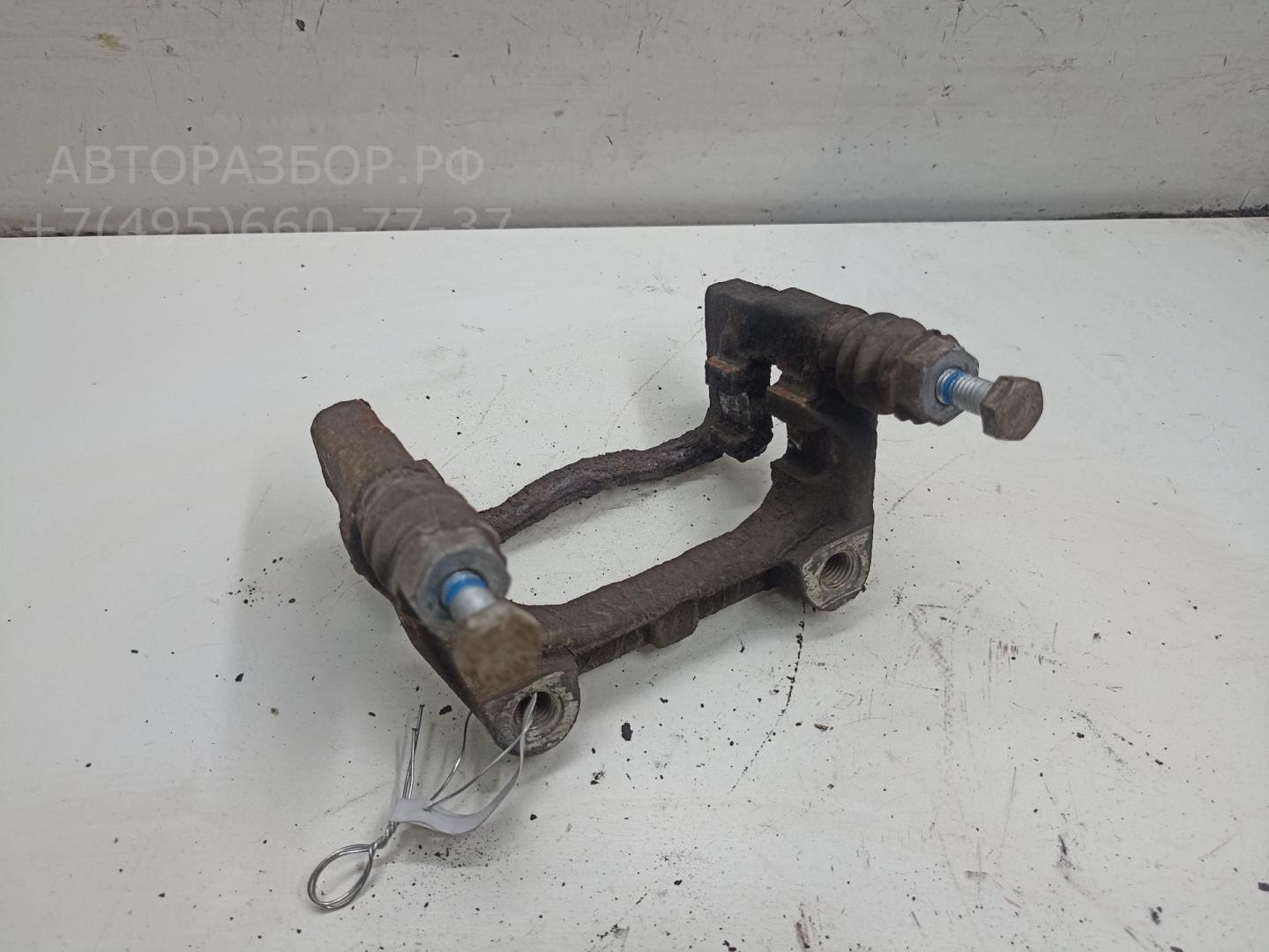 Скоба суппорта заднего