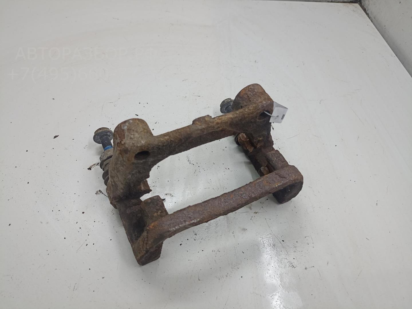 Скоба суппорта заднего