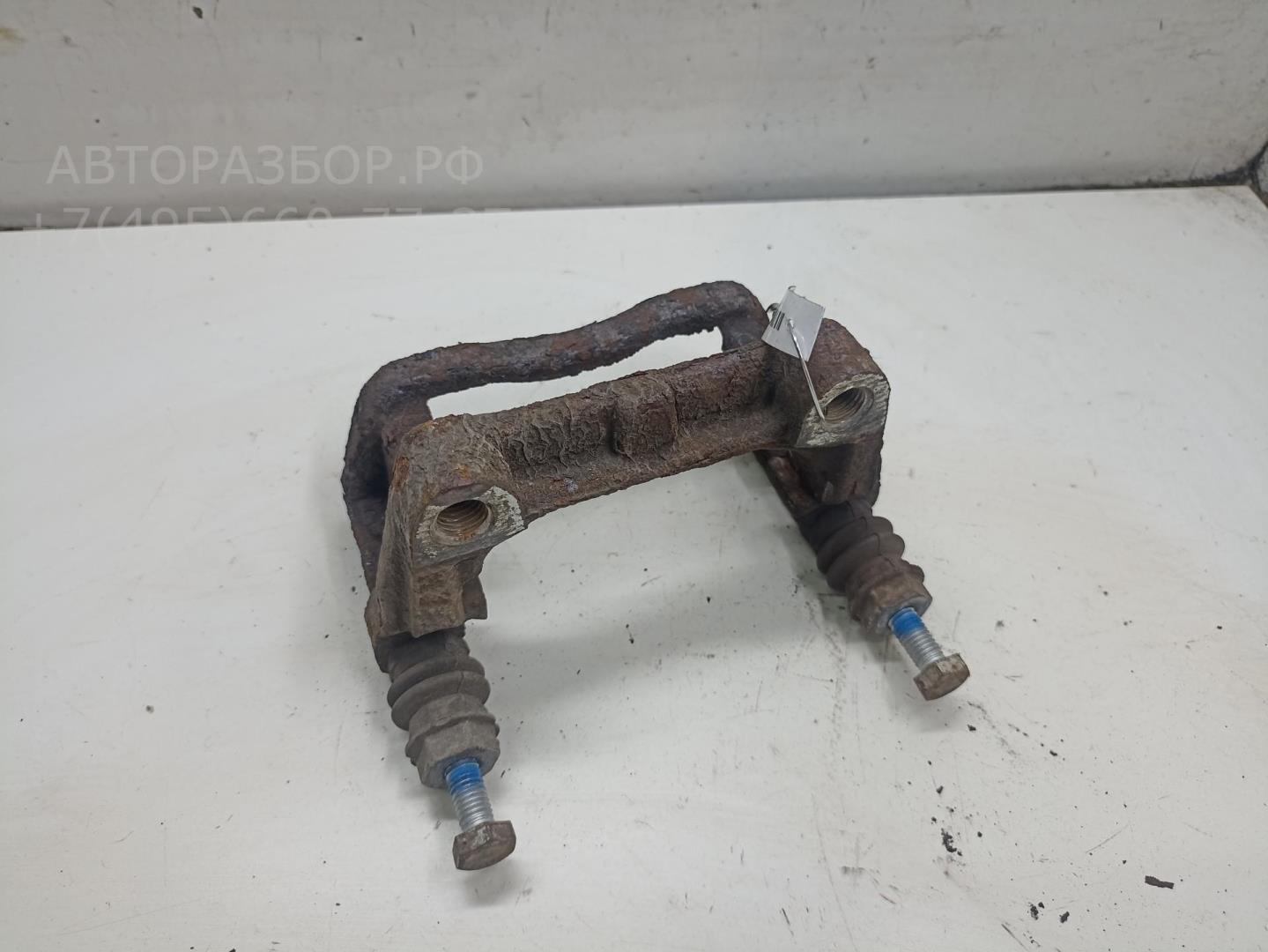 Скоба суппорта заднего