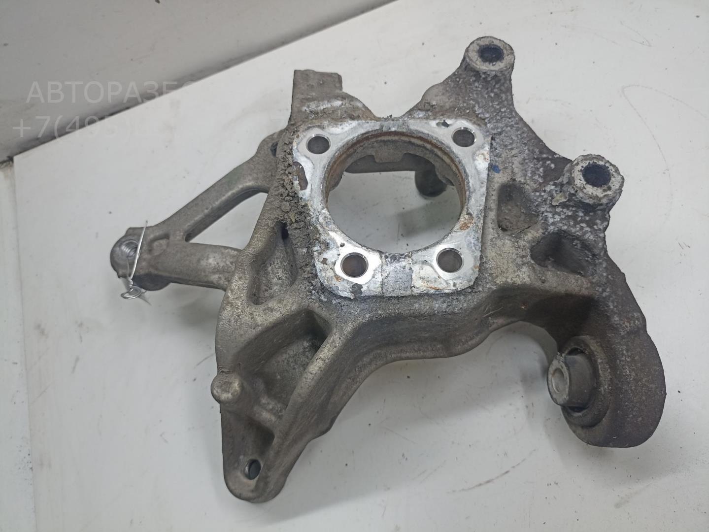 Кулак поворотный задний левый