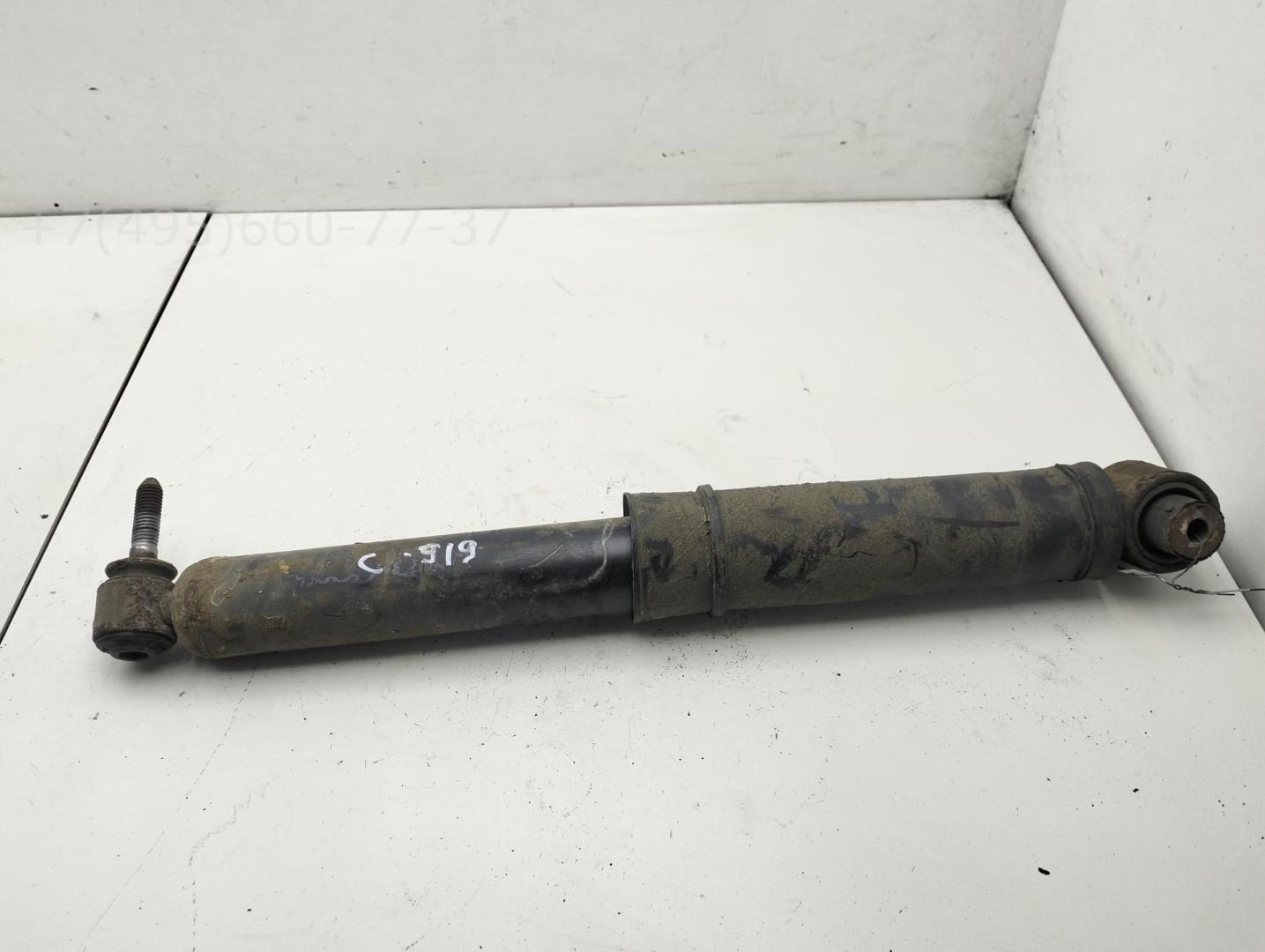 Амортизатор задний левый