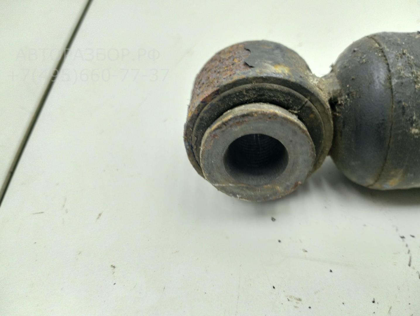 Амортизатор задний левый