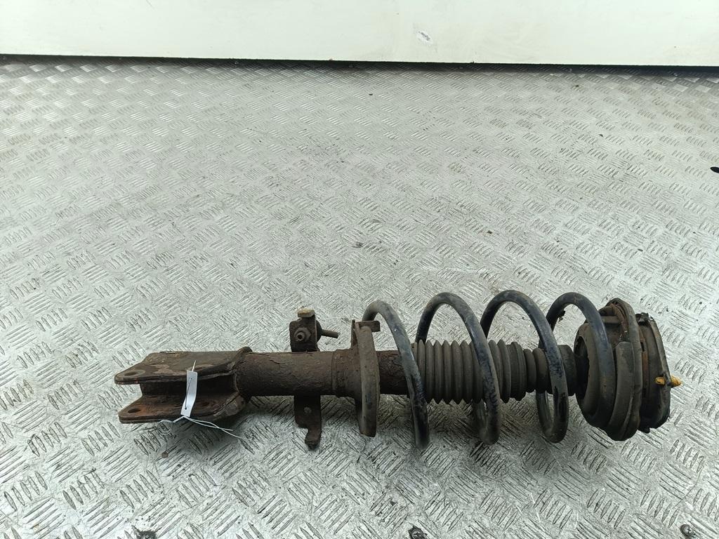 Амортизатор передний левый