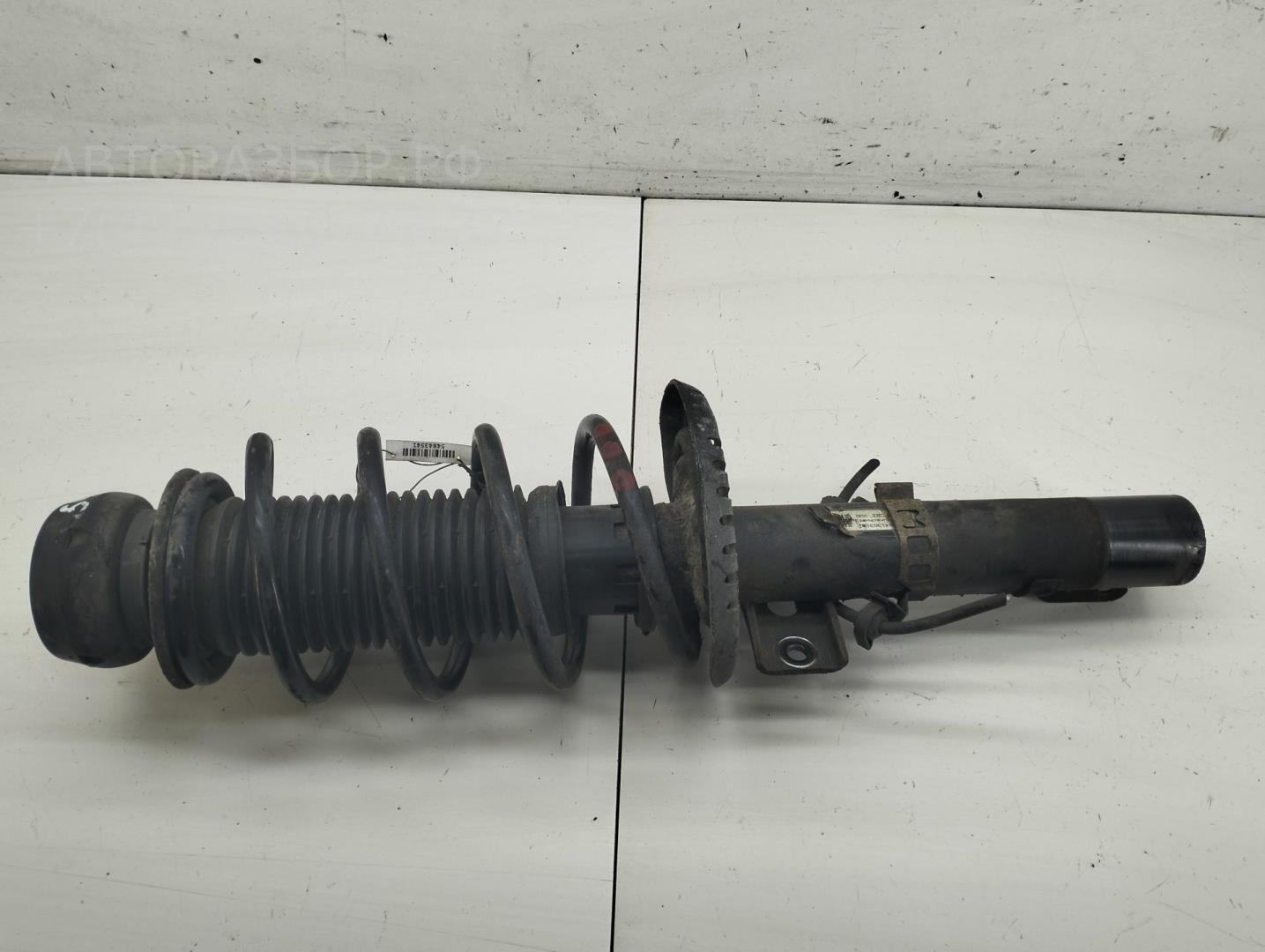 Амортизатор передний левый