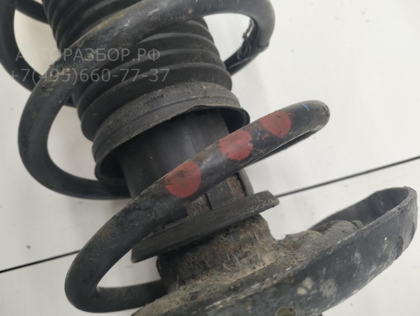 Амортизатор передний левый