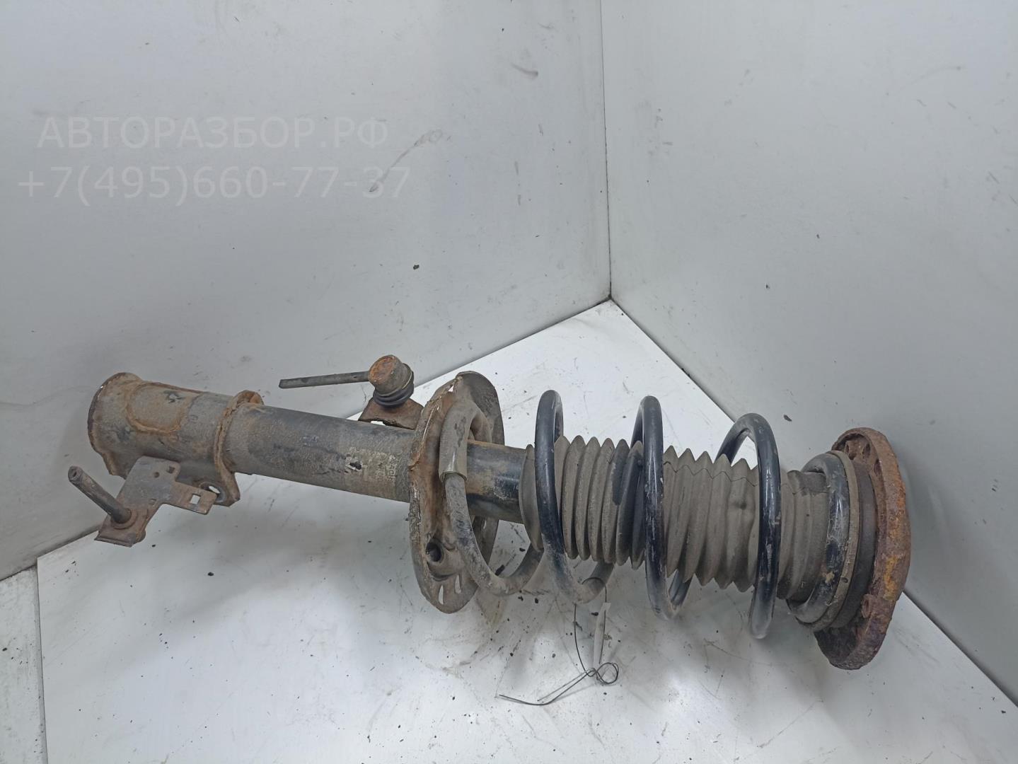 Амортизатор передний левый