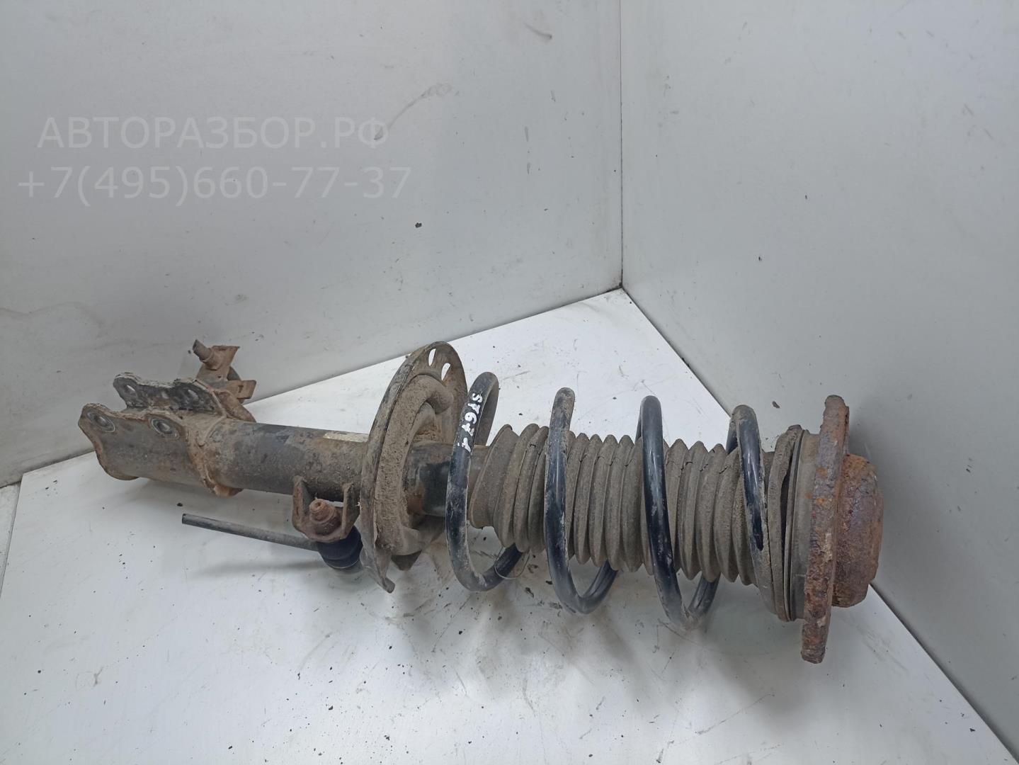 Амортизатор передний левый