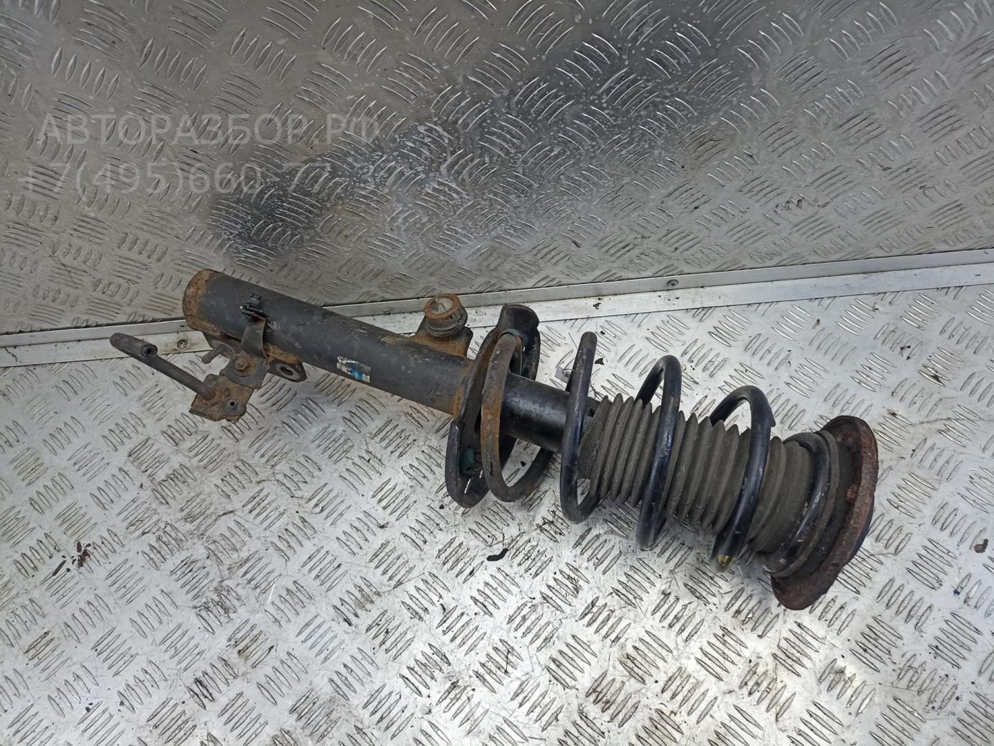 Амортизатор передний левый