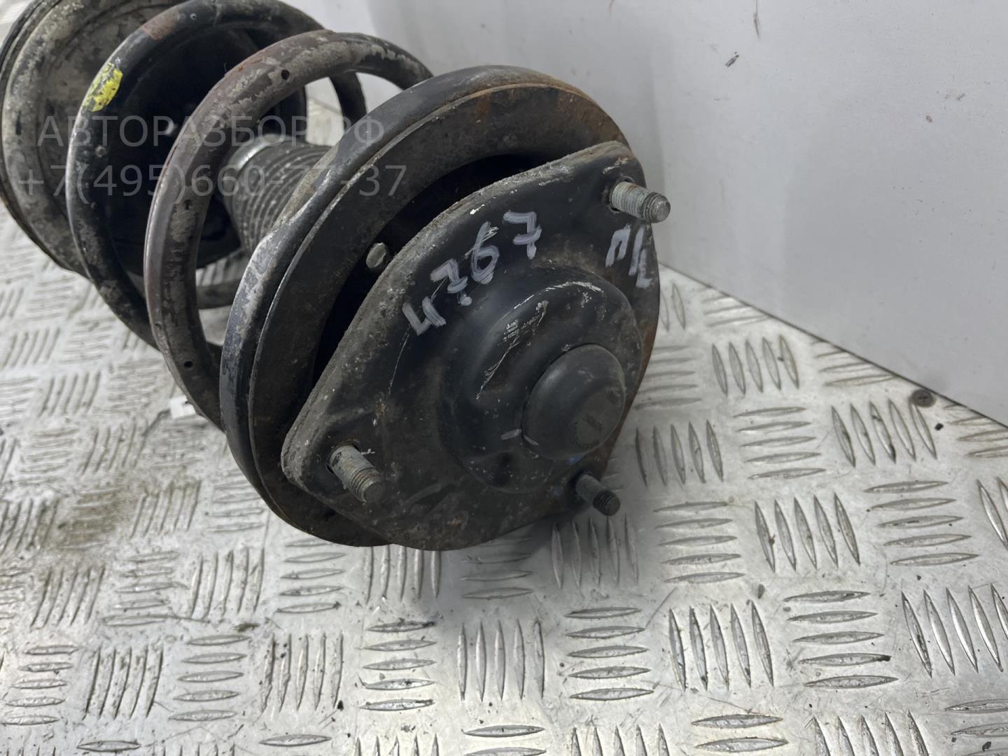 Амортизатор передний левый