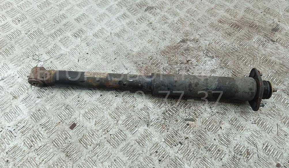 Амортизатор задний левый