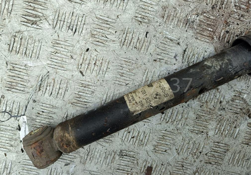 Амортизатор задний левый